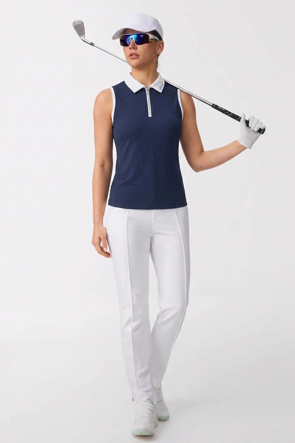 The Sleeveless Zip Neck Golf Polo - Navy