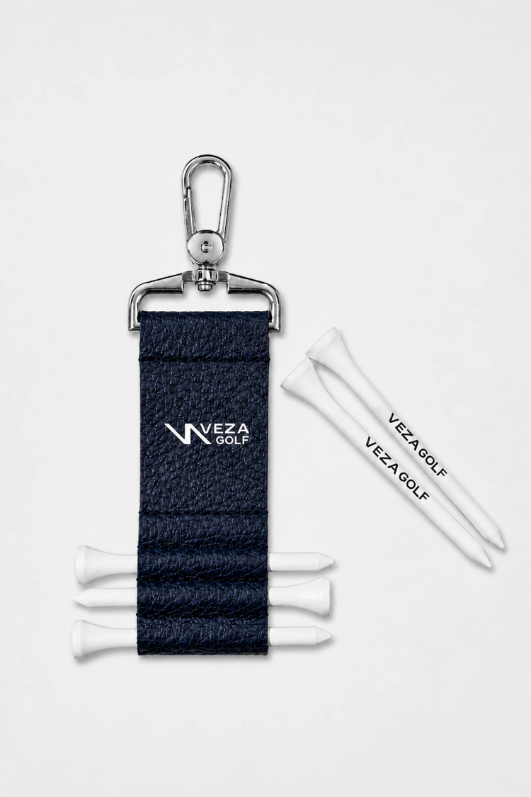 Veza Golf keychain with golf tees on a white background