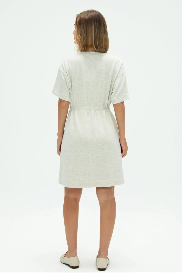 Back view of women’s heather mist cinched T-shirt dress showing clean silhouette