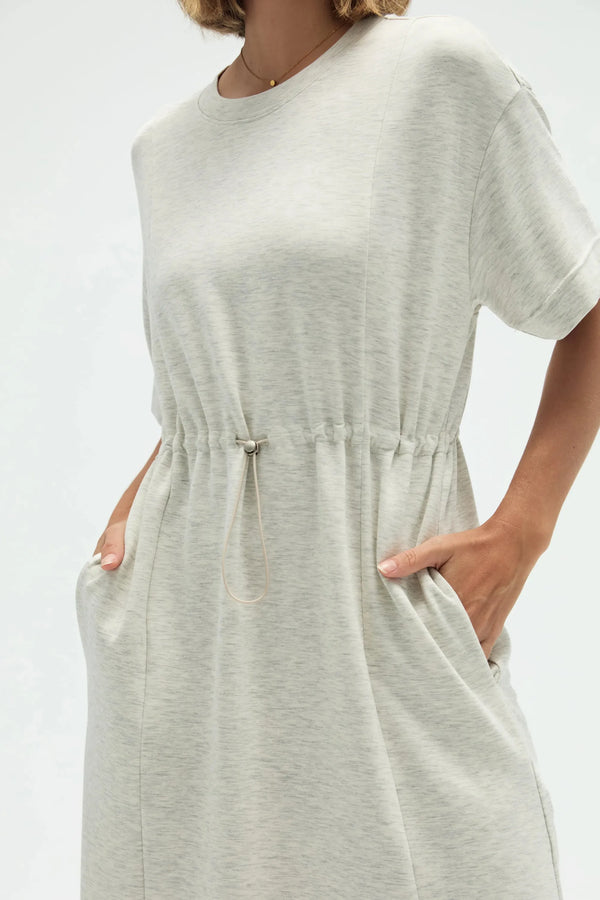 Close-up of heather mist T-shirt dress highlighting drawstring waist and soft Tencel fabric
