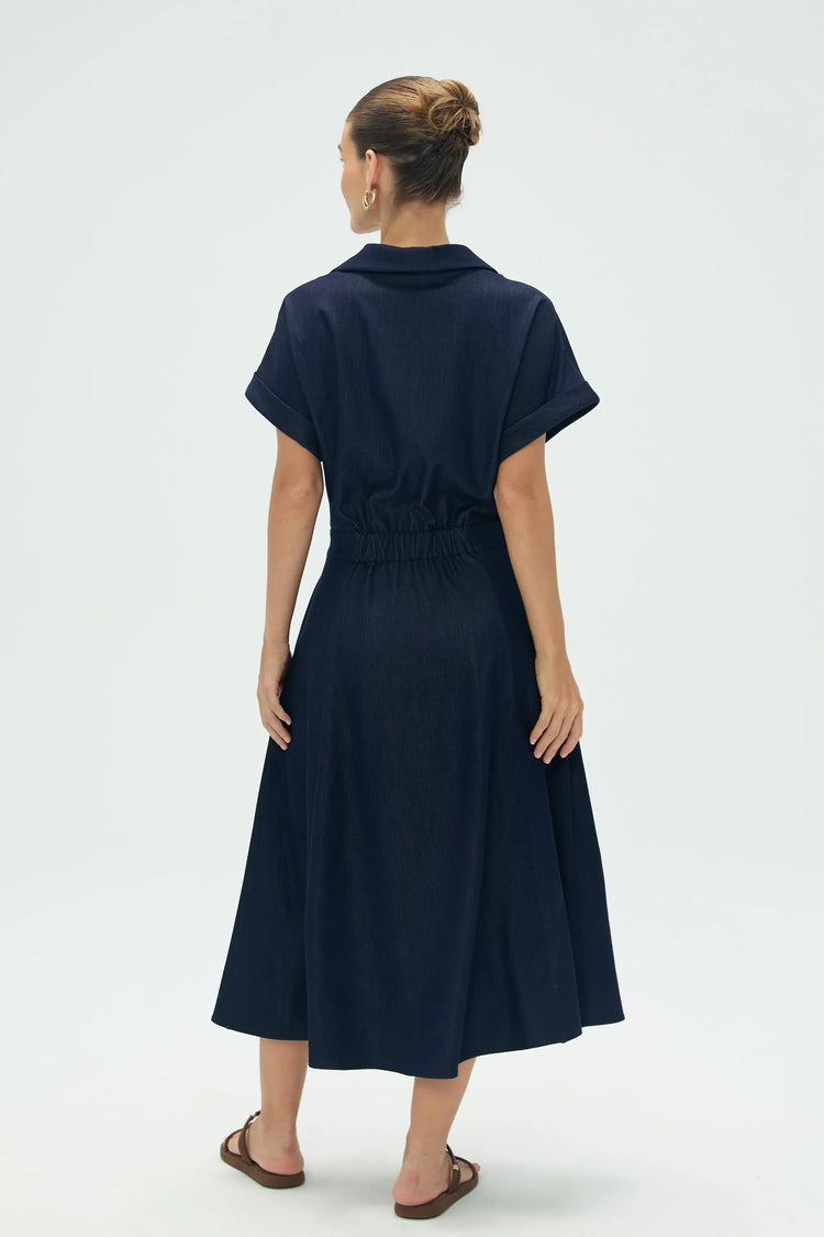 Back view of women’s deep navy coastal shirt and midi skirt set