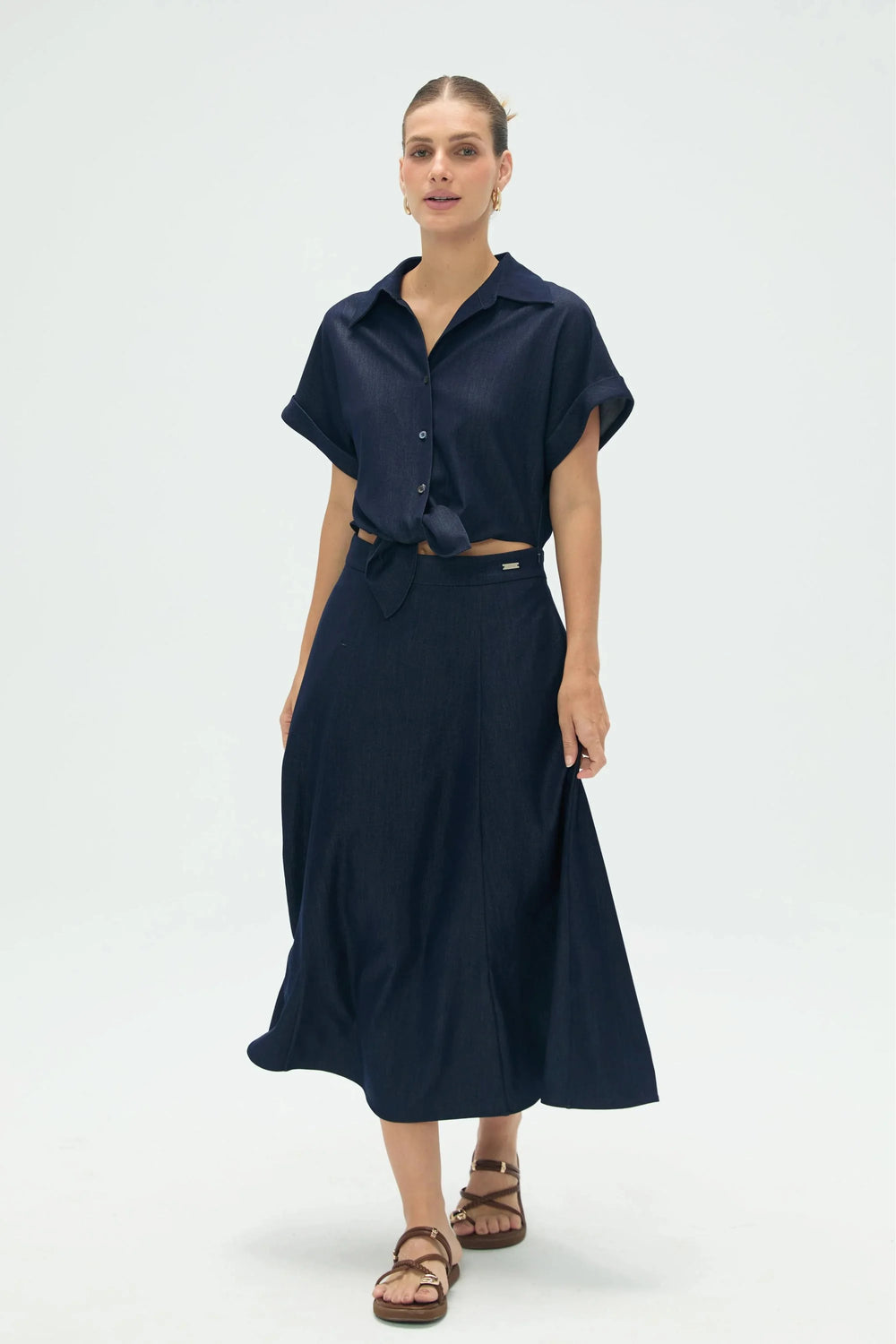 Women’s deep navy coastal set with relaxed button-up shirt and flowy midi skirt, full-body front view