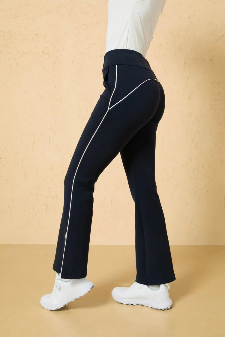 Side view of contrast stitch flare pants in Inkstone highlighting a streamlined leg line