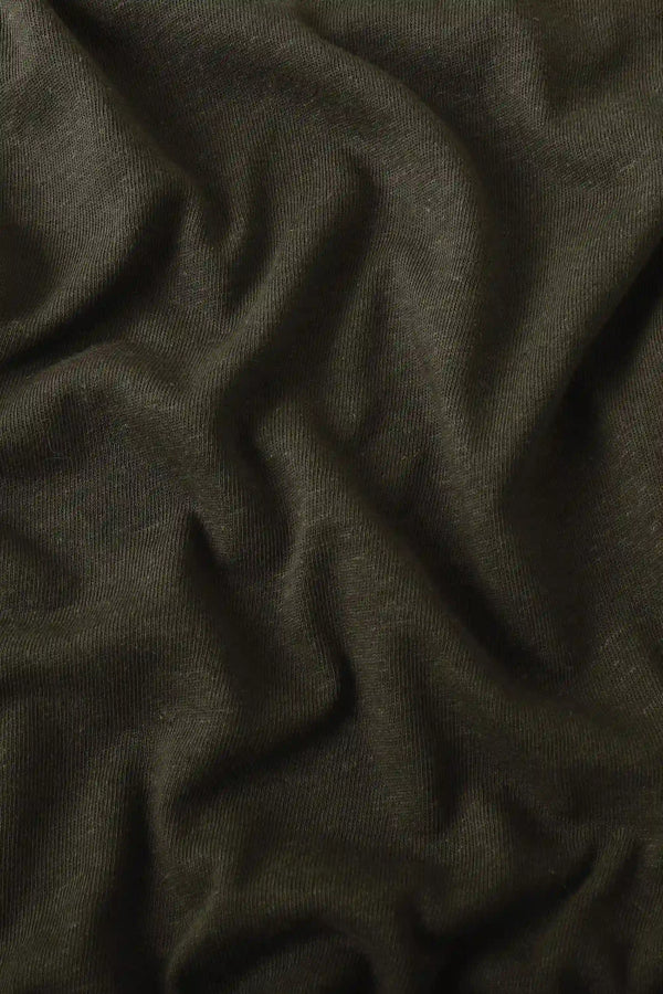 Close-up of espresso cotton linen tank fabric showing soft texture and subtle structure