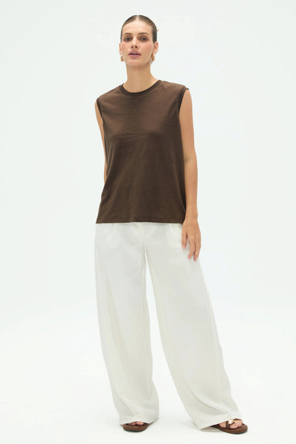 Women’s espresso cotton linen tank paired with a pair of white pants styled for a clean, modern full-body look
