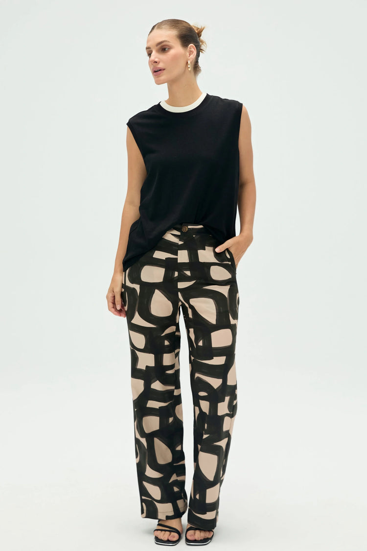 Women’s noir black cotton linen tank styled for a clean, modern full-body look