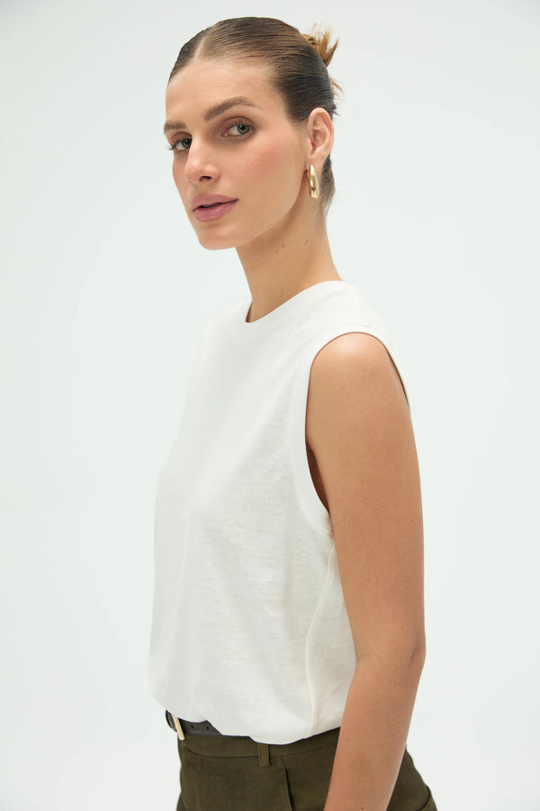 Side view of women’s white cotton linen tank with clean, minimal lines