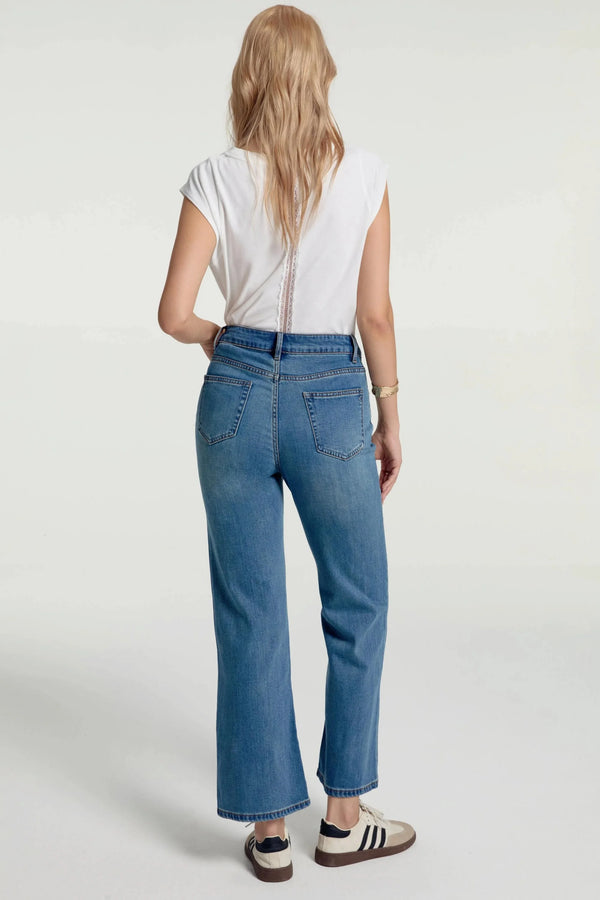 Back view of pacific blue kick-flare jeans with a clean, everyday fit