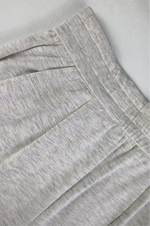 Close-up of breathable Tencel™ fabric showing a smooth, lightweight texture
