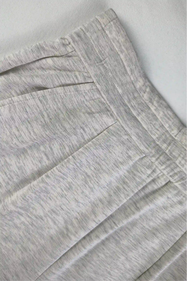 Close-up of breathable Tencel™ fabric showing a smooth, lightweight texture