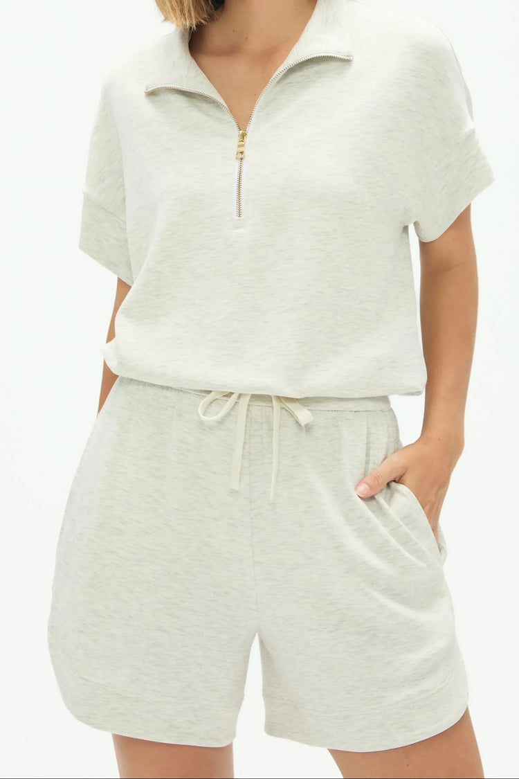 Light grey half-zip lounge polo designed for effortless everyday comfort