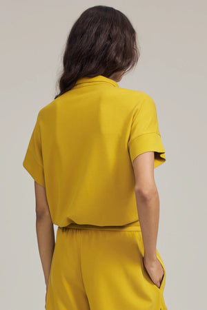 Back view of a Tencel™ short-sleeve lounge polo with a clean, relaxed silhouette