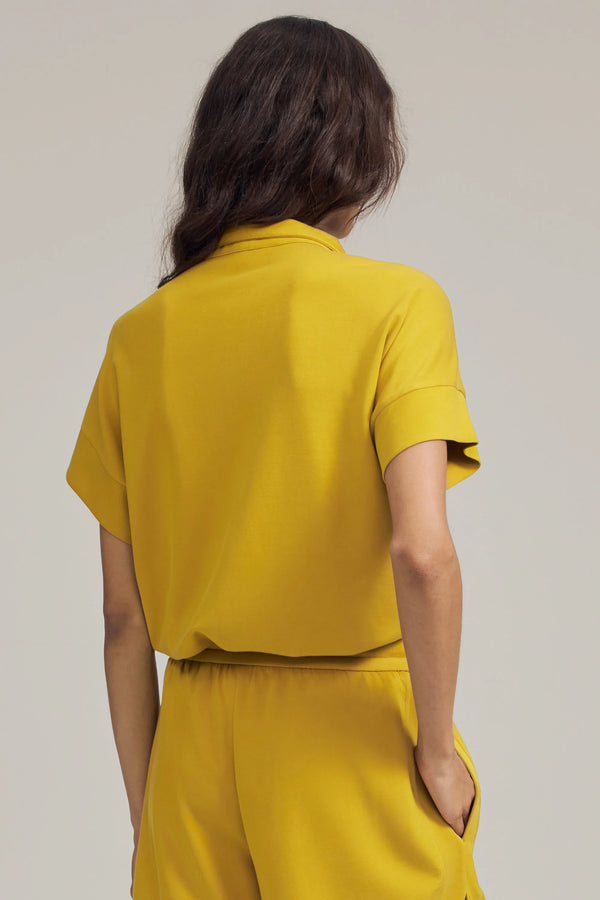 Back view of a Tencel™ short-sleeve lounge polo with a clean, relaxed silhouette