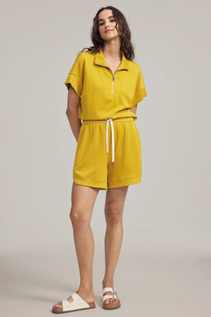 Marigold half-zip lounge polo designed for effortless everyday comfort