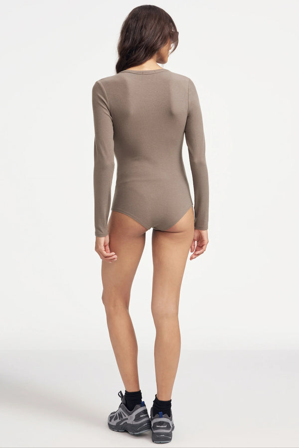 Back view of women’s long-sleeve mocha bodysuit with clean, seamless silhouette