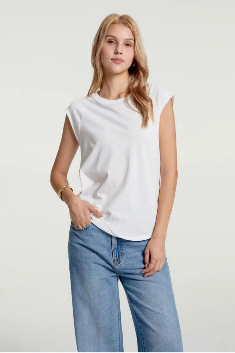 Women’s porcelain white lace-back cap sleeve tee shown from a relaxed front angle