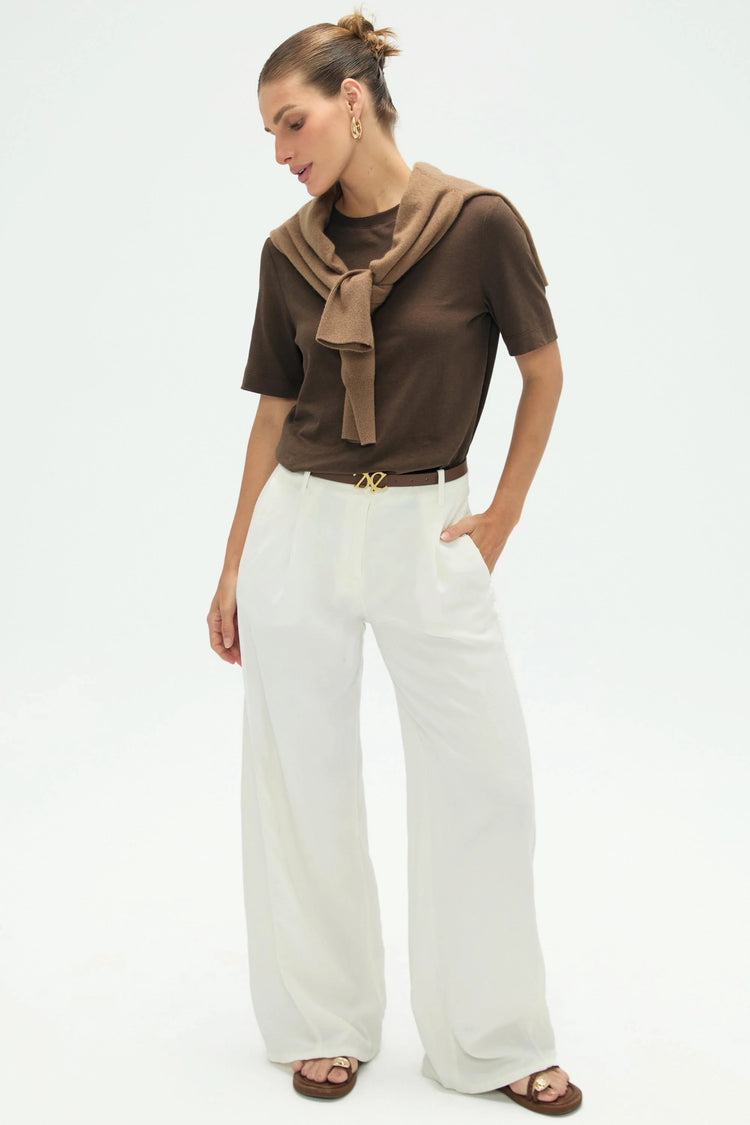 Women’s espresso crewneck tee styled with white pants and a knit layer, full-body front view