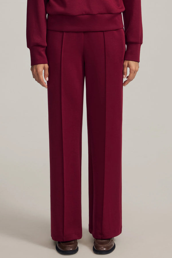 Front view of Burgundy Wine high-rise flare pants with a clean, elegant silhouette
