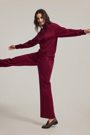 Luxe wool-blend flare pants styled for refined comfort and effortless elegance