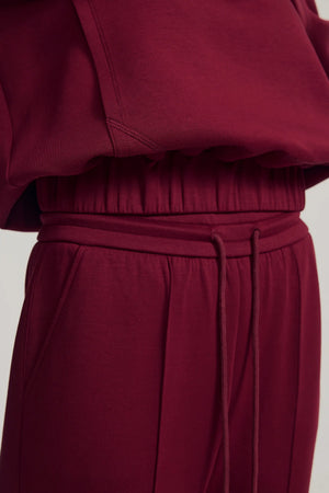 Detail view of the jogger waistband highlighting a comfortable elastic fit and smooth drape