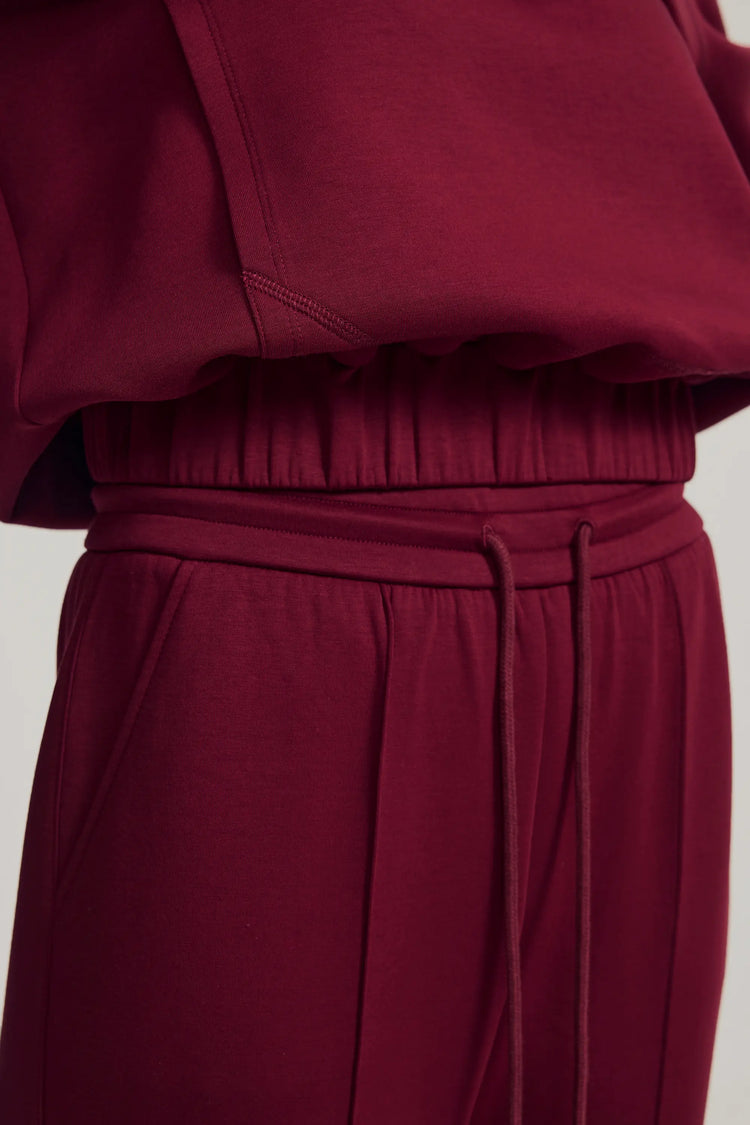 Detail view of the jogger waistband highlighting a comfortable elastic fit and smooth drape