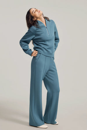 Luxe wool-blend half-zip pullover designed for effortless, polished everyday wear