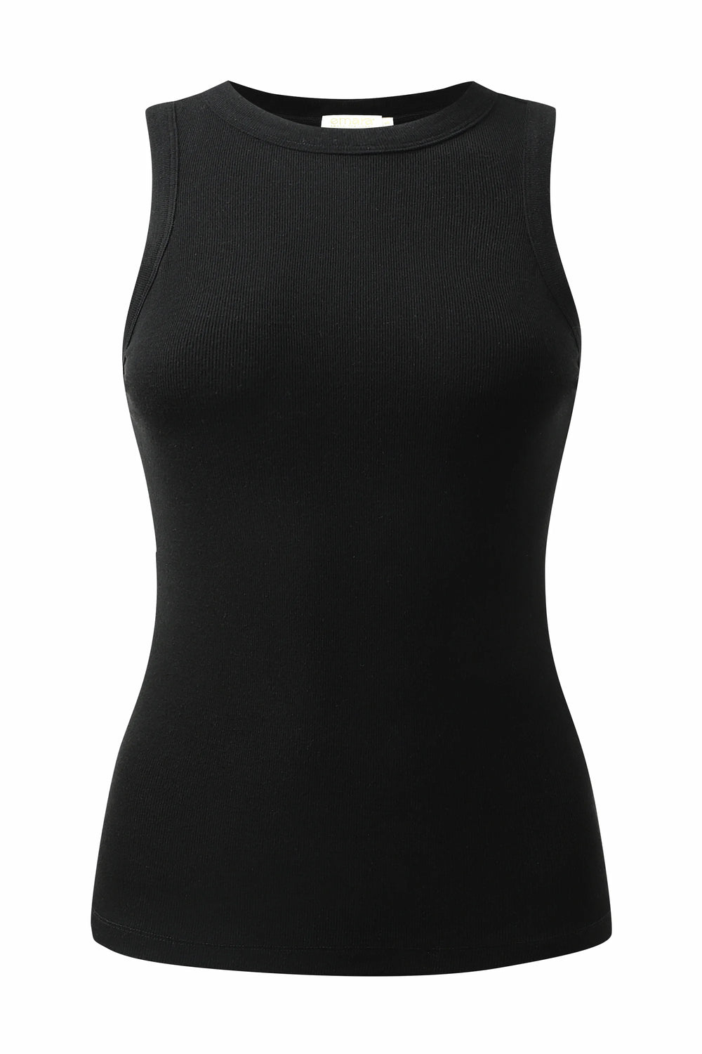 Women’s true black racerback tank worn seated on the floor, highlighting relaxed comfort