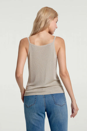 Back view of women’s nude luster shimmer knit tank styled with blue jeans