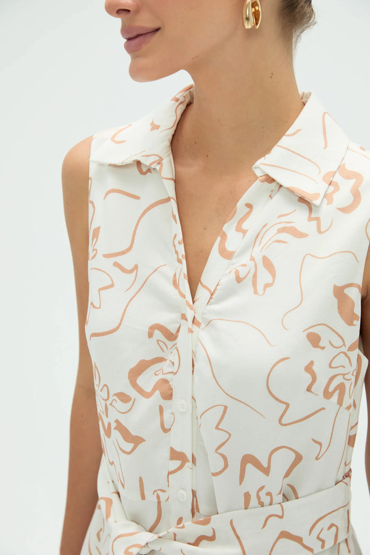 Upper-body view of women’s sand bloom sleeveless shirt dress highlighting V-neckline