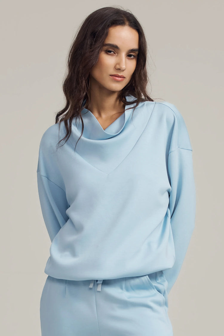 Front view of a lightweight cowl-neck pullover highlighting effortless drape and ease