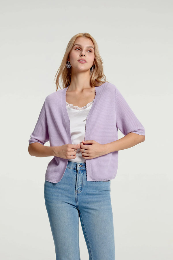 Women’s soft knit hook-front cardigan highlighting airy texture and gentle drape
