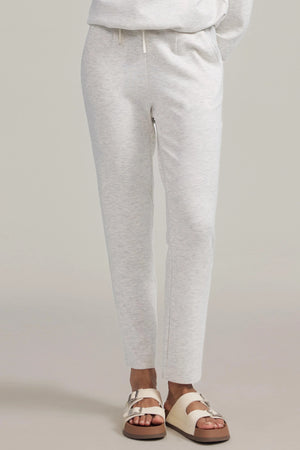 Front view of light grey Tencel™ lounge pants with a smooth, tailored drape