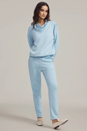 High-waisted tapered lounge pants in powder blue designed for effortless everyday comfort