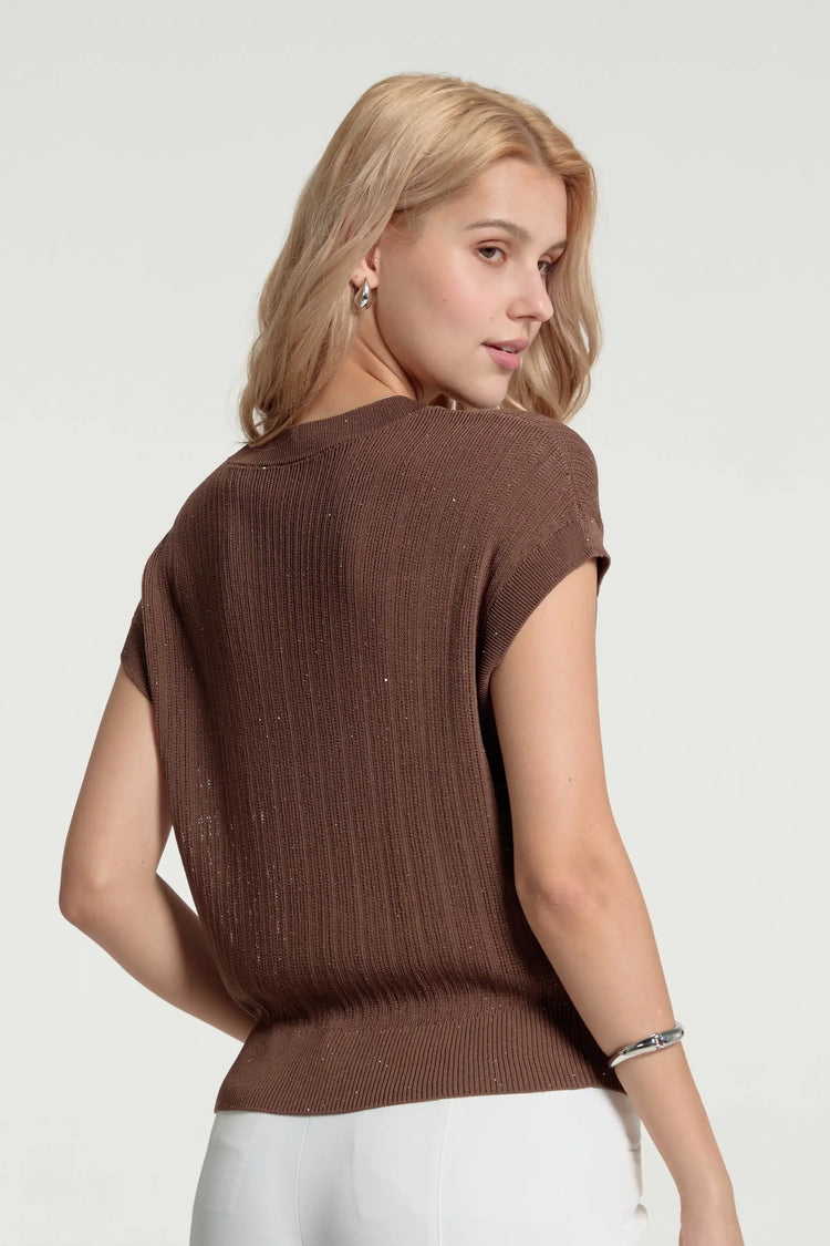 Back view of women’s espresso luxe sparkle ribbed knit V-neck top styled with white pants