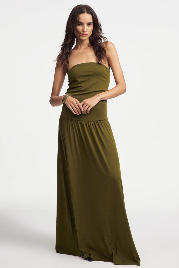 Women’s olive green strapless maxi dress showing clean lines and flowing silhouette, full-body front view