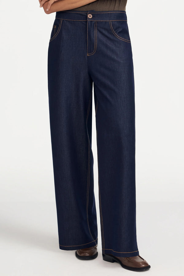 Front view of high-rise tailored wide-leg denim in ink rinse with a polished dark wash