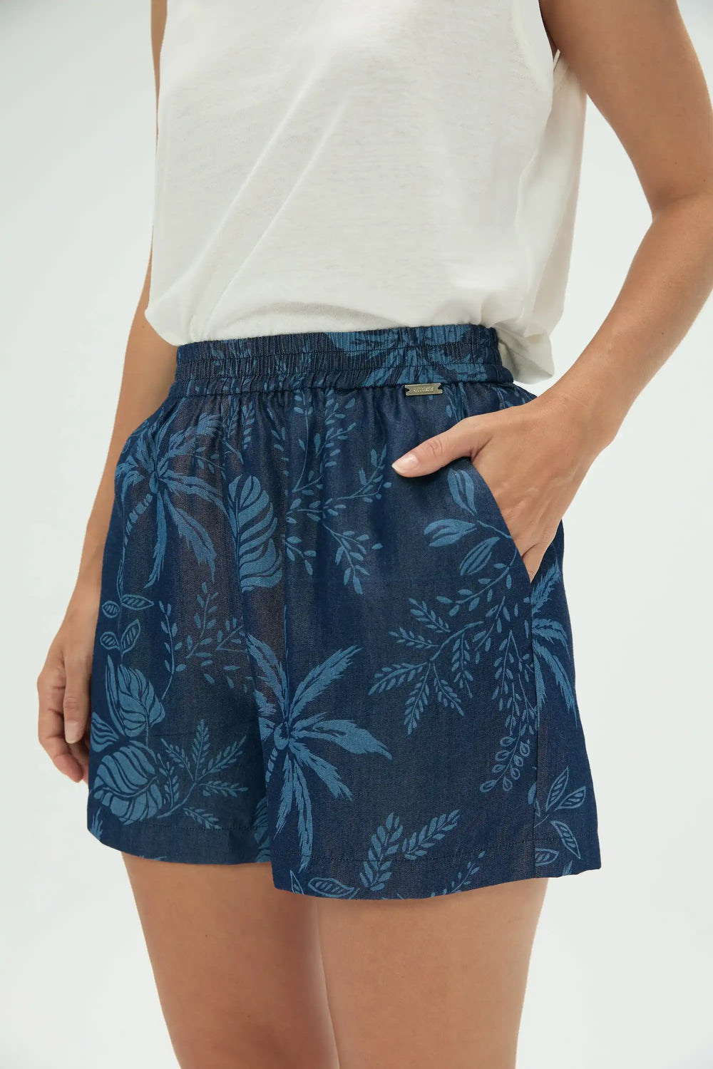 Women’s indigo palm tropical pull-on shorts with elastic waist, lower-body front view