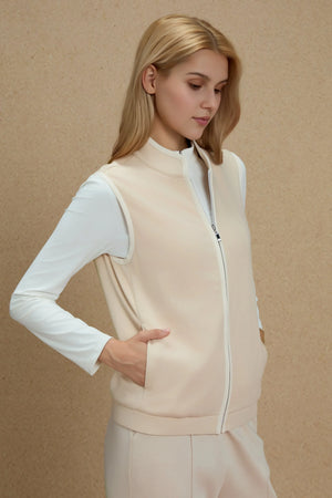 Close-up of the pocket detail on a zip-front vest crafted in a viscose–silk blend