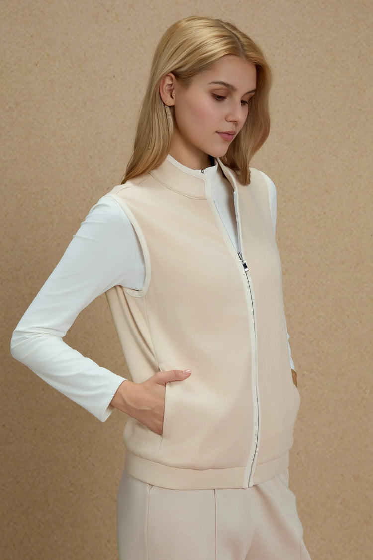 Close-up of the pocket detail on a zip-front vest crafted in a viscose–silk blend