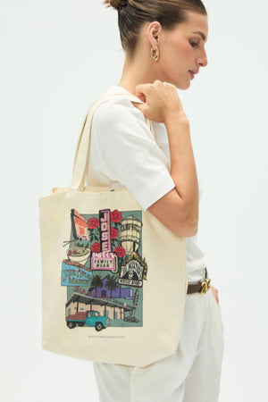 Cotton canvas tote featuring San Jose landmarks worn over the shoulder, front view