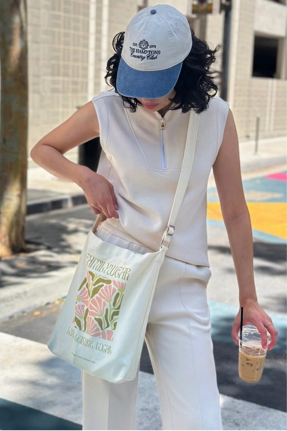 Handheld everyday canvas tote featuring the Wild Bloom botanical print, front view