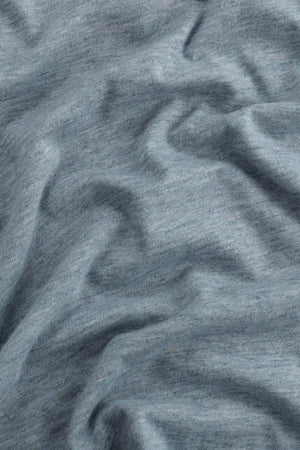 Close-up of the steel blue cotton-Tencel fabric, highlighting softness and breathable everyday comfort.
