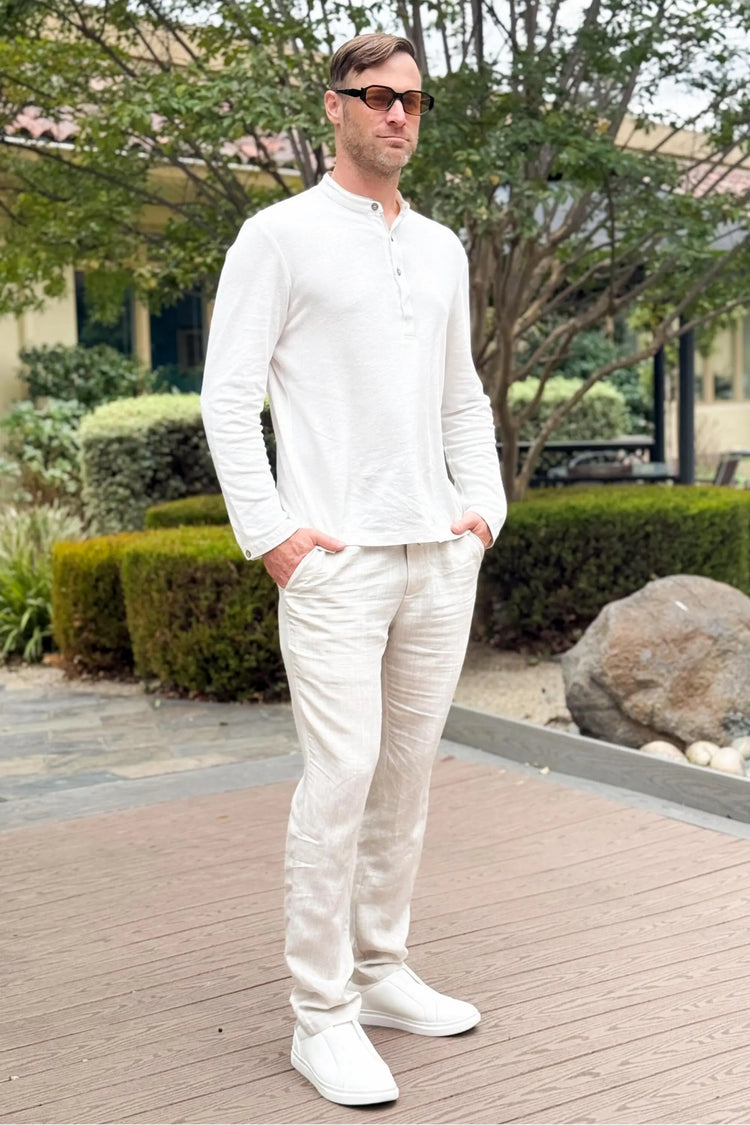 Men’s alpine white linen–Supima button-neck henley styled with linen pants for a relaxed, refined everyday look.