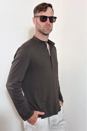 Side view of a men’s espresso cotton linen–Supima henley, highlighting the relaxed structure and breathable drape.