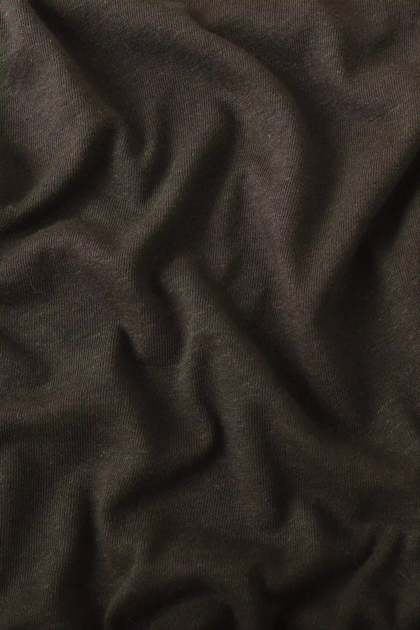 Close-up of the espresso linen–Supima blend fabric, highlighting softness and breathable comfort.