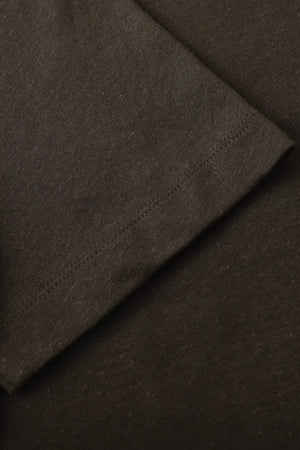 Detail view of the sleeve finish on a men’s espresso linen–Supima crewneck tee.