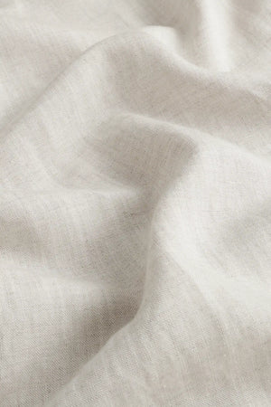Close-up of the driftwood beige linen-Tencel fabric, showcasing lightweight texture and breathable comfort.