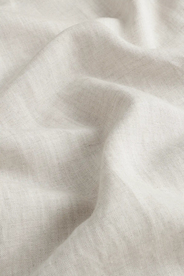 Close-up of the driftwood beige linen-Tencel fabric, showcasing lightweight texture and breathable comfort.