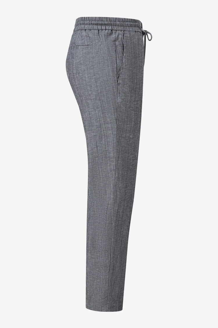 3D side view of men’s heather grey linen-Tencel drawstring trousers highlighting a breathable, relaxed silhouette.