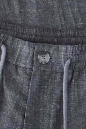 Close-up of the waistband detail on men’s heather grey linen-Tencel drawstring trousers, designed for adjustable comfort.